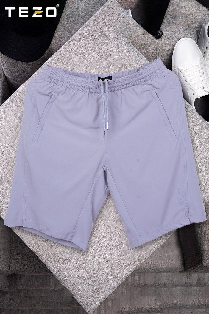 Quần đùi gió thể thao in sườn trái