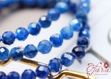  Vòng tay Kyanite mài giác mix charm bạc 