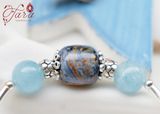  Vòng cặp đá Mắt Bão mix Aquamarine và Charm Bạc 