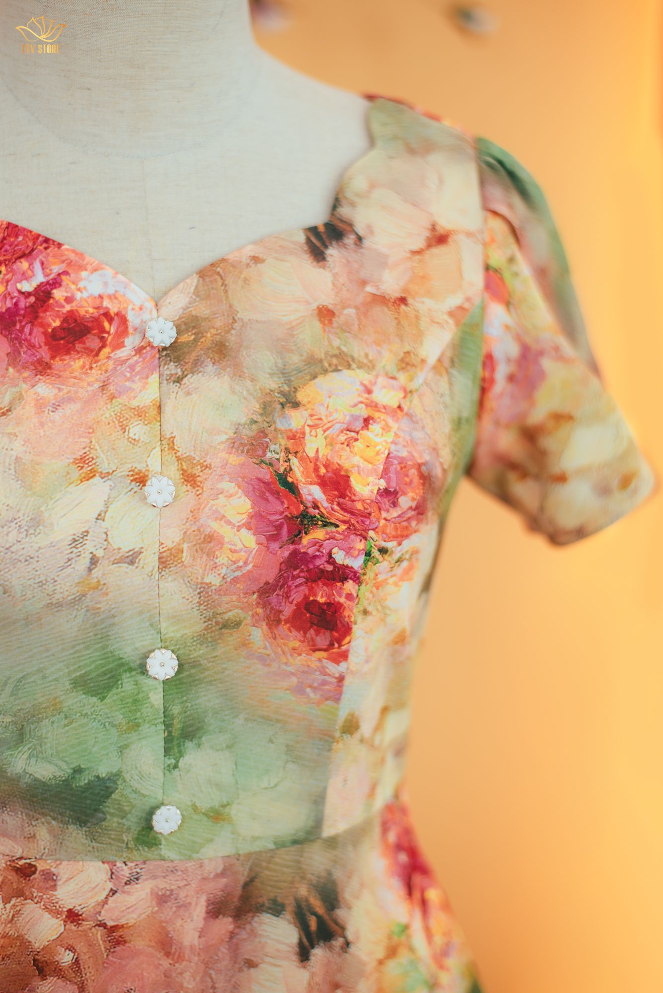 Đầm xòe - Cổ tim sóng nước kết nút tay búp - CT - Xanh cam họa tiết - TTV1714