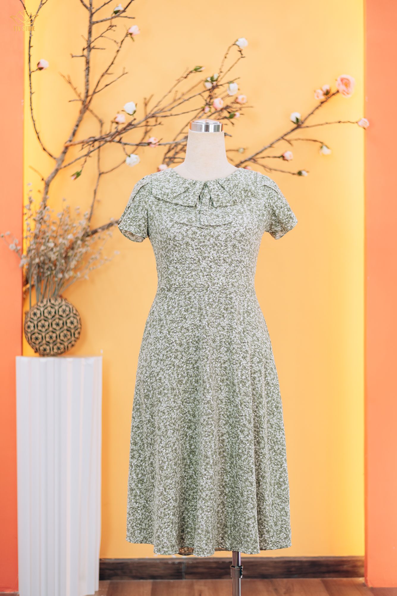 Đầm xòe - Cổ tròn nơ tay ngắn - CT - Xanh hoa nhí - TTV1819