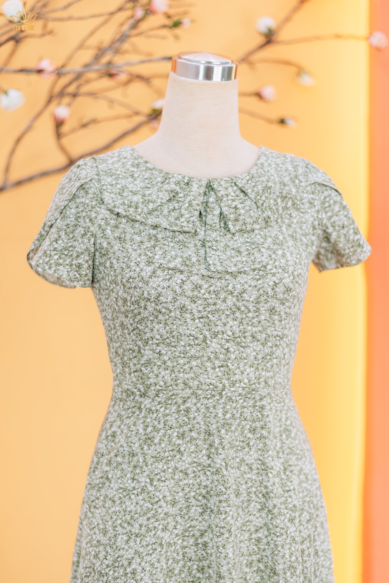 Đầm xòe - Cổ tròn nơ tay ngắn - CT - Xanh hoa nhí - TTV1819