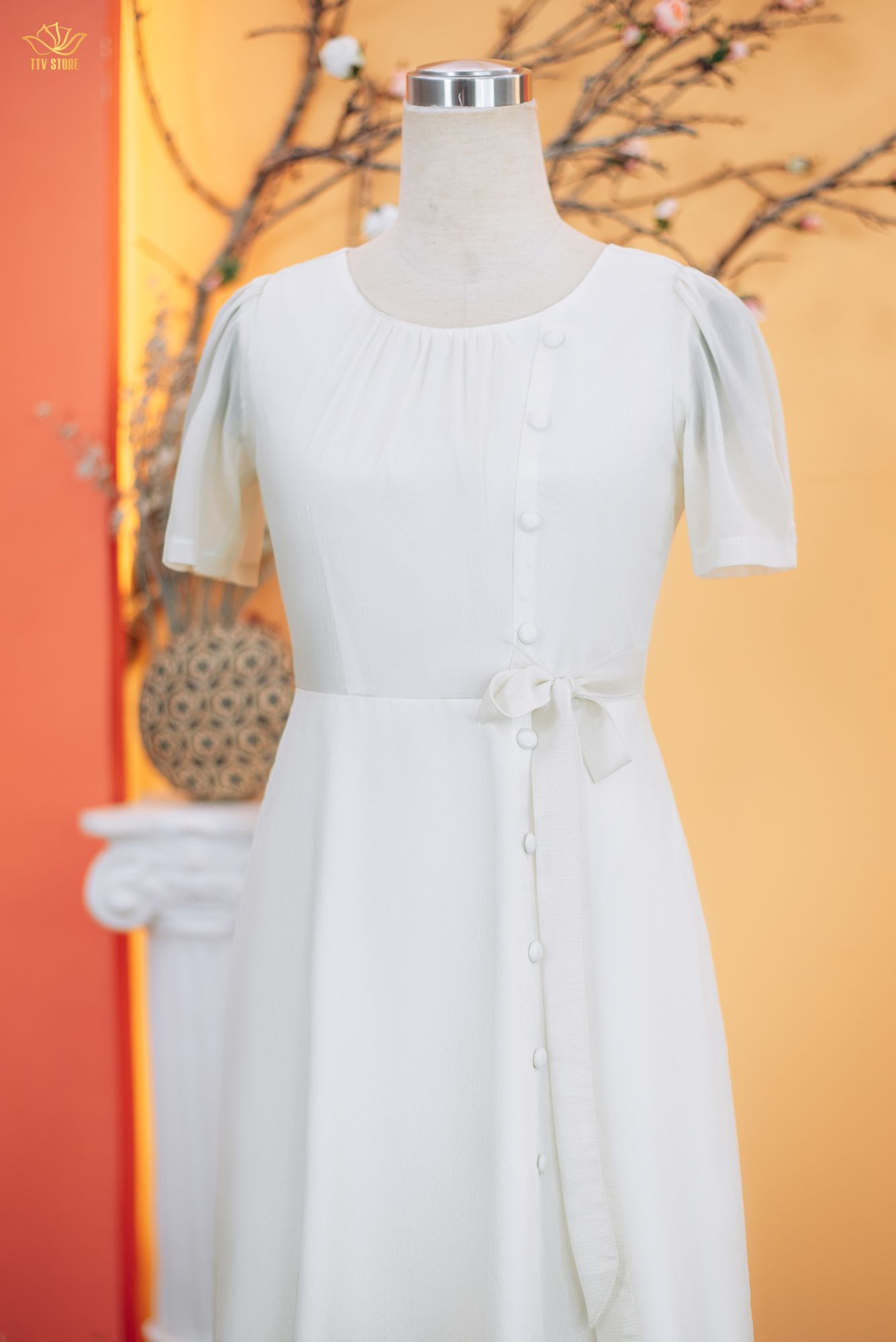 Đầm xòe - Cổ tròn kết nút thắt nơ tay ngắn - CD - Trắng kem - TTV1844
