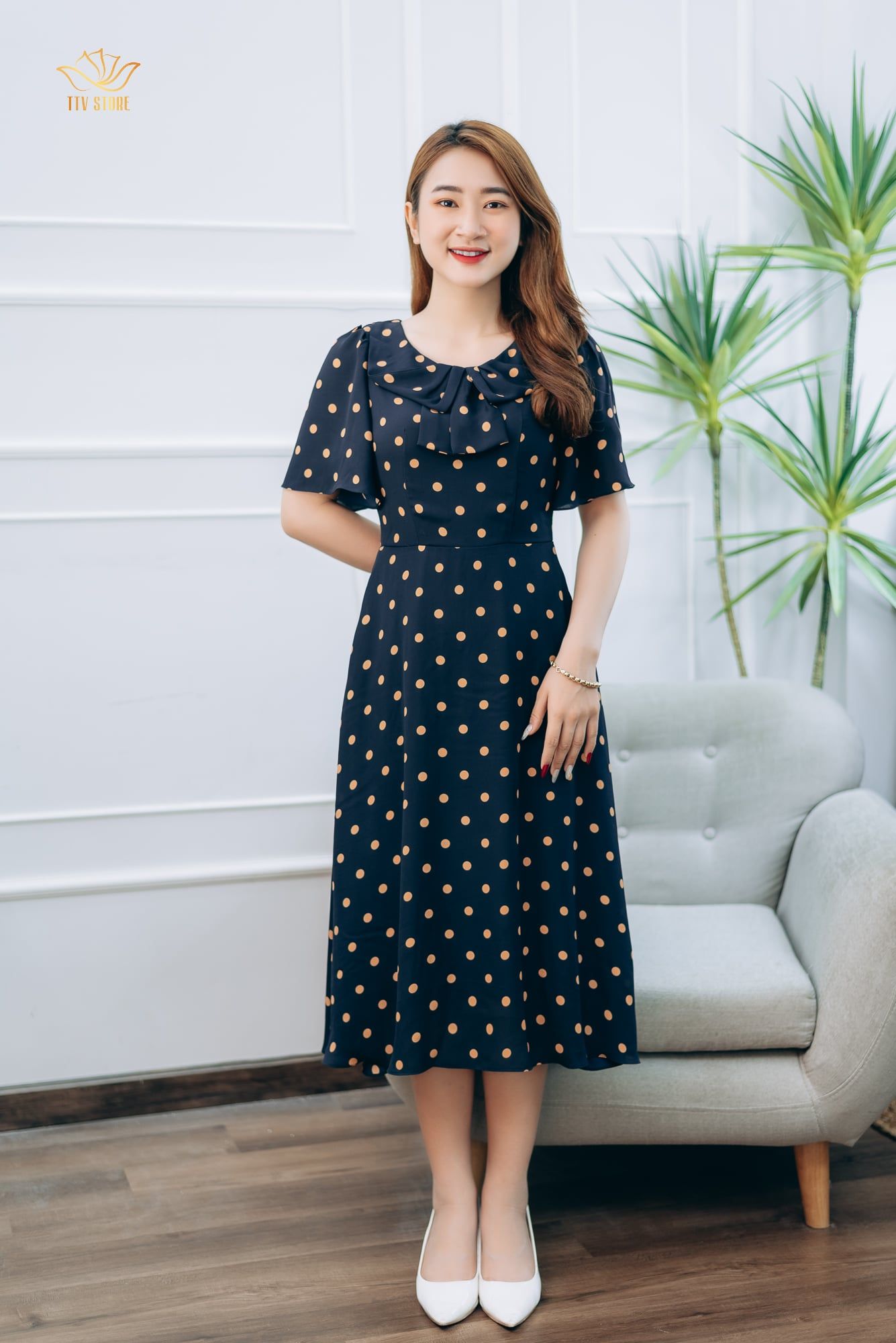 Đầm xòe - Cổ tròn nơ tay loe - CT - Xanh chấm bi nâu - TTV1363