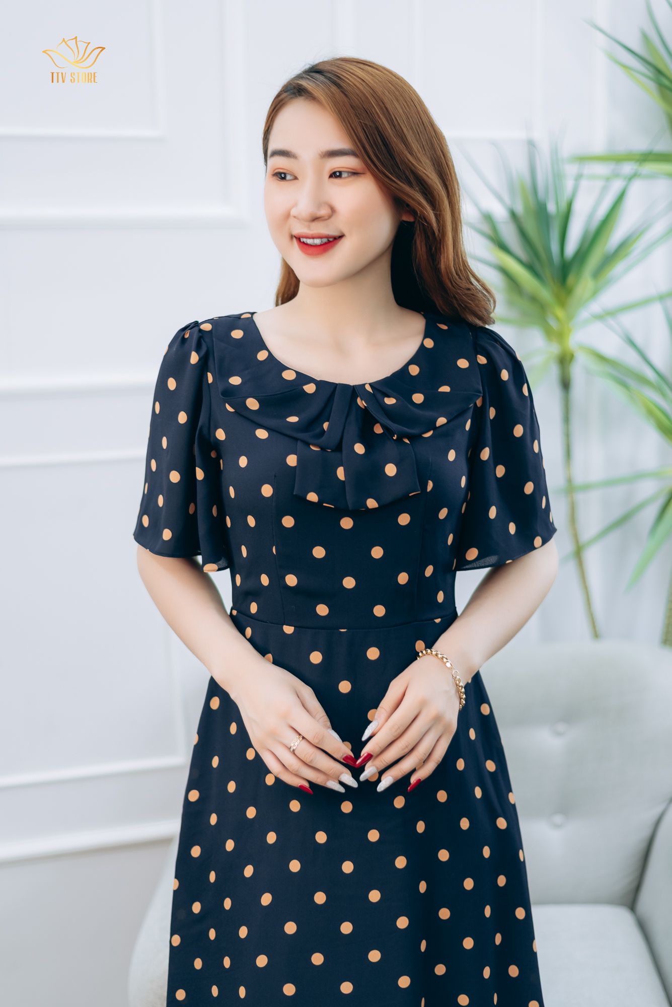 Đầm xòe - Cổ tròn nơ tay loe - CT - Xanh chấm bi nâu - TTV1363