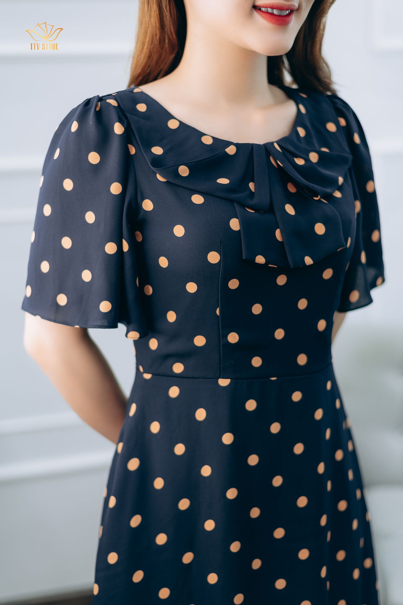 Đầm xòe - Cổ tròn nơ tay loe - CT - Xanh chấm bi nâu - TTV1363