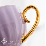 Bộ ấm chén gốm sứ họa tiết màu tím