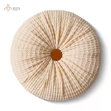 Gối tròn vải sần beige nhấn khuy cam nâu