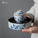 Bộ ấm trà gốm sứ hoạ tiết lá tre vẽ tay