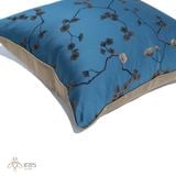 Gối vải satin thêu hoa nhí nền xanh
