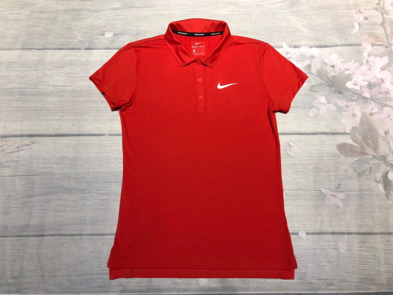 Áo hiệu Nike nữ.  830422-634