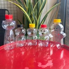 Giá Sỉ Chỉ Từ 1 Bành 60 chai nhựa PET Hình Bánh Quy Gừng  500ML - Bình đựng trà sữa,nước ép,bánh kẹo