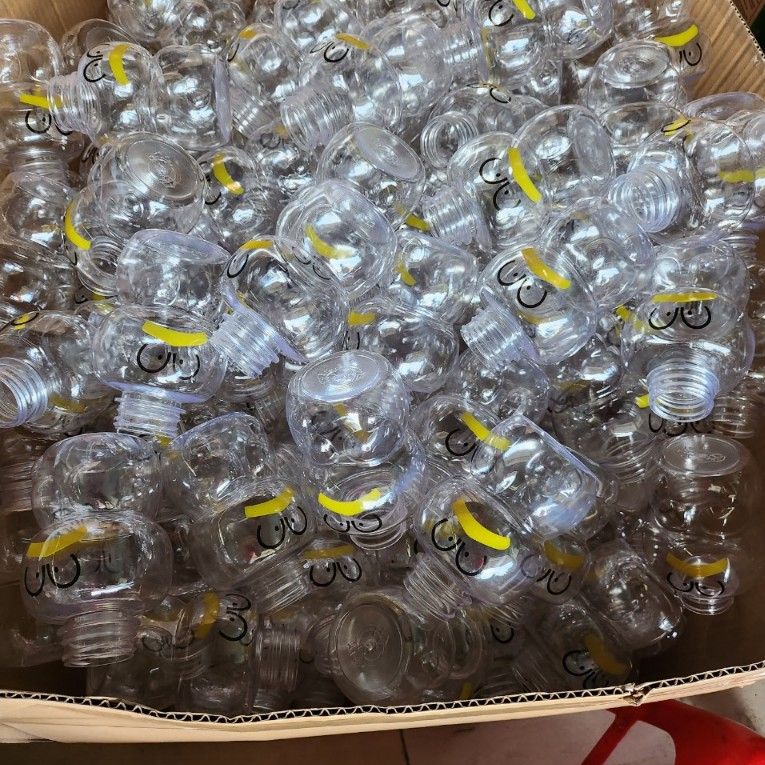 Giá Sỉ Chỉ Từ 1 Bành 70 Chai nhựa PET đựng trà sữa,nước ép,bánh kẹo Vịt  nón vàng 350ml