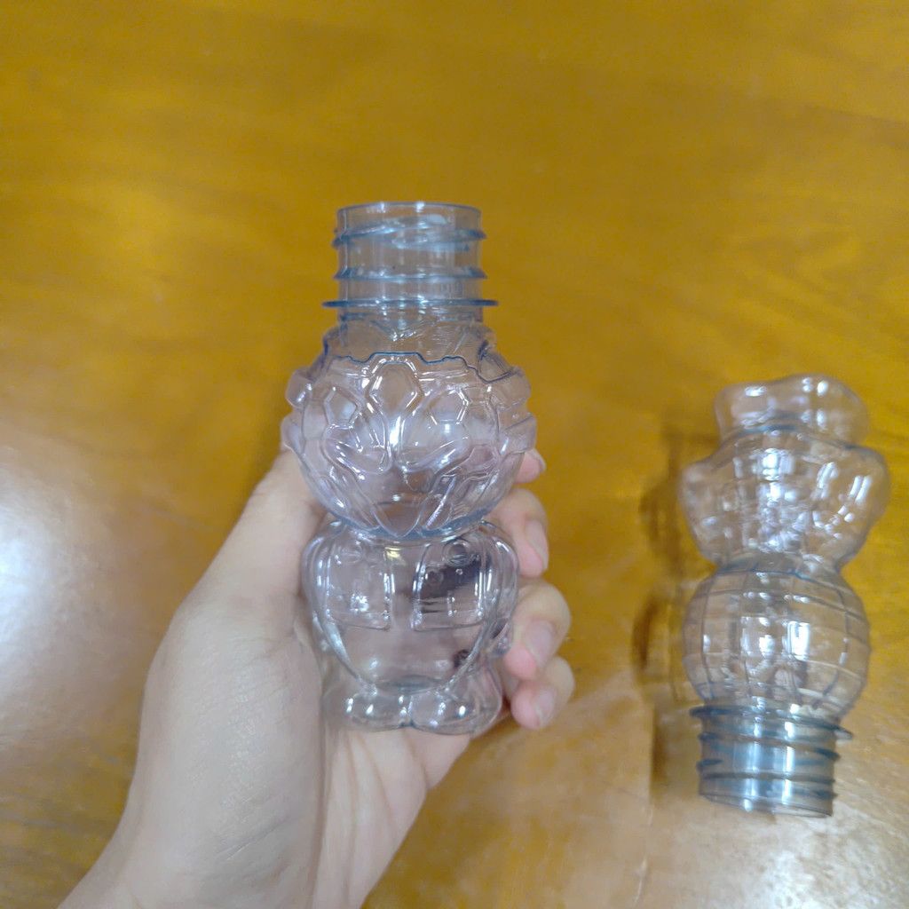 Chai nhựa 100ml đựng cốm , kẹo kèm nắp màu trắng - Chai hình con ong & người nhện đáng yêu, cứng cáp