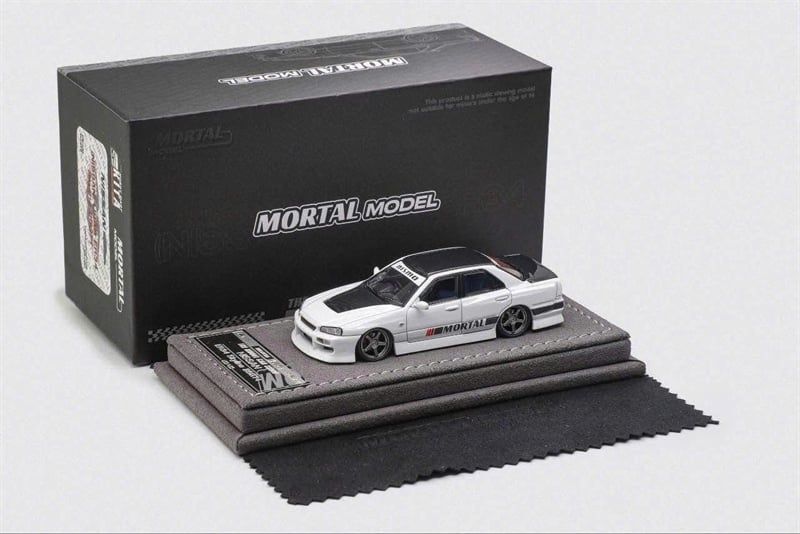  Mô hình xe Nissan Uras ER34 Skyline 25GT-T White TMCS 2025 tỉ lệ 1:64 Mortal Model OT64422 