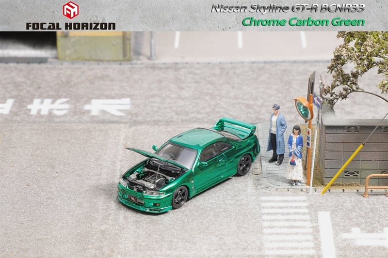  Mô hình xe Nissan Nismo S-Tune R33 version Full Carbon Chrome Green tỉ lệ 1:64 Focal Horizon OT64329 