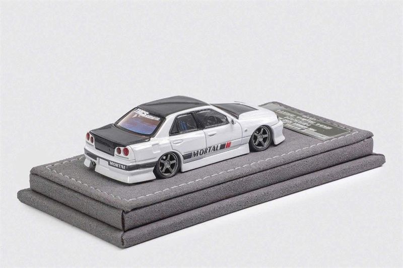  Mô hình xe Nissan Uras ER34 Skyline 25GT-T White TMCS 2025 tỉ lệ 1:64 Mortal Model OT64422 