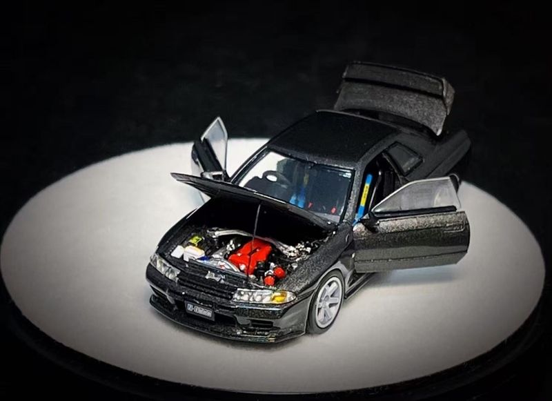  Mô hình xe Nissan GTR R32 Metallic Gray Limited to 999 tỉ lệ 1:64 PGM PGM-641101 