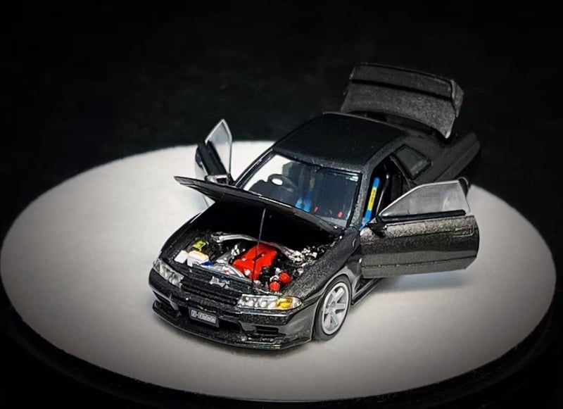  Mô hình xe Nissan GTR R32 Metallic Gray Limited to 999 tỉ lệ 1:64 PGM PGM-641101 