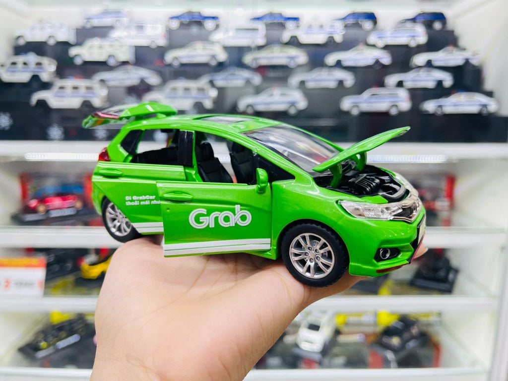 Mô hình xe độ dịch vụ taxi Grab - White Honda Jazz SUV 5 chỗ full open tỉ lệ 1:32 Chezhi Autono1 OT32001