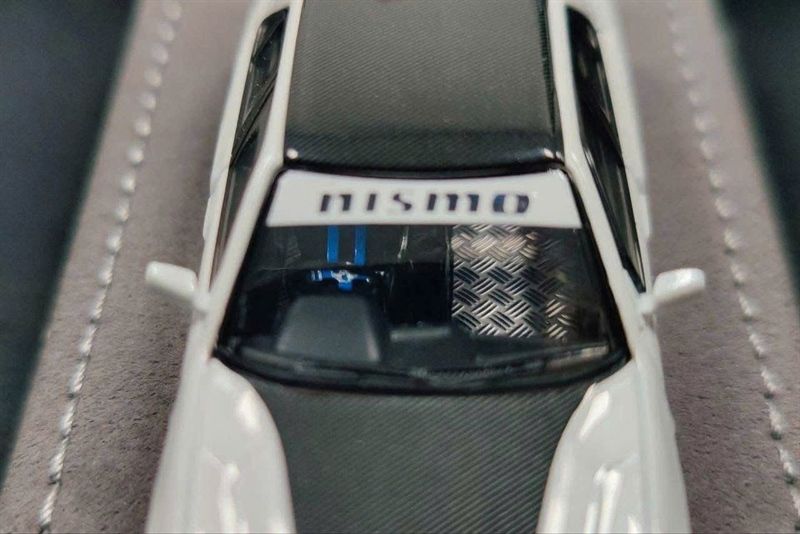  Mô hình xe Nissan Uras ER34 Skyline 25GT-T White TMCS 2025 tỉ lệ 1:64 Mortal Model OT64422 