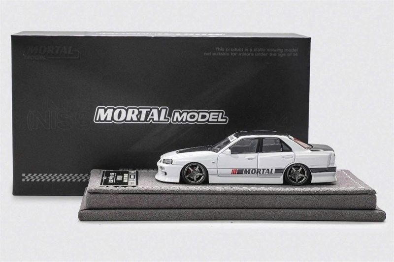  Mô hình xe Nissan Uras ER34 Skyline 25GT-T White TMCS 2025 tỉ lệ 1:64 Mortal Model OT64422 