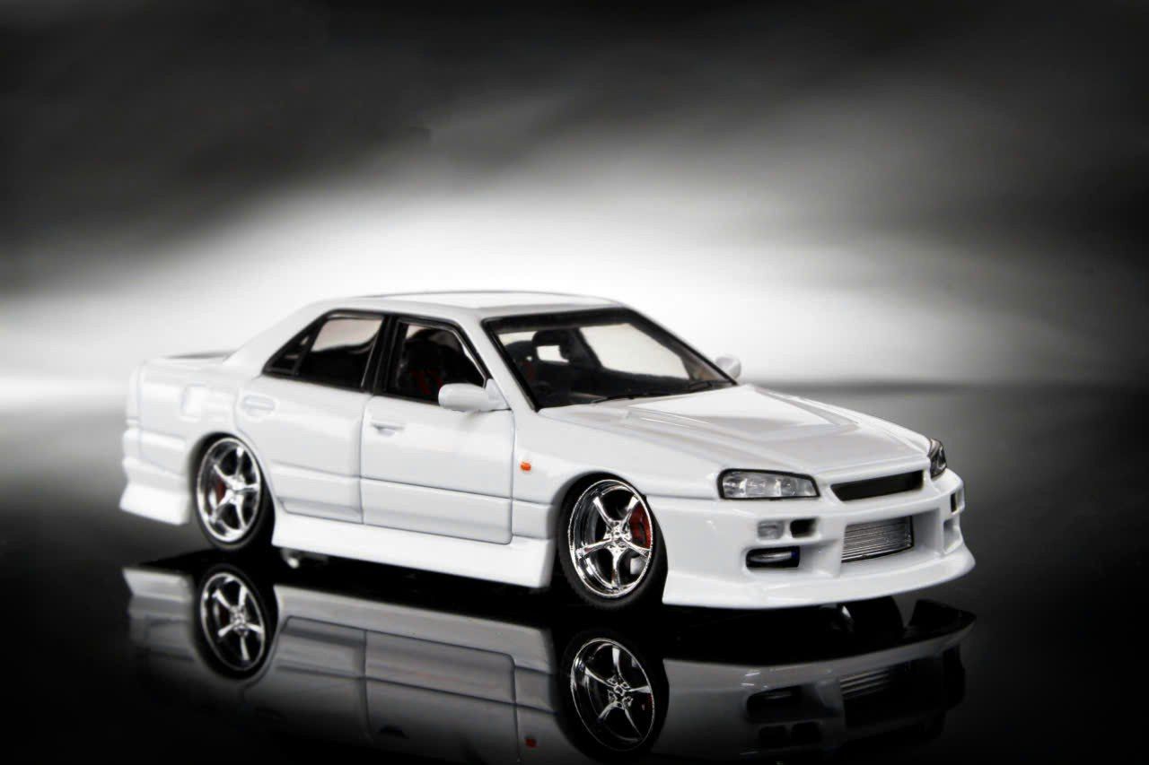  Mô hình xe NISSAN URAS ER34 limited tỉ lệ 1:64 Mortal models OT64084 