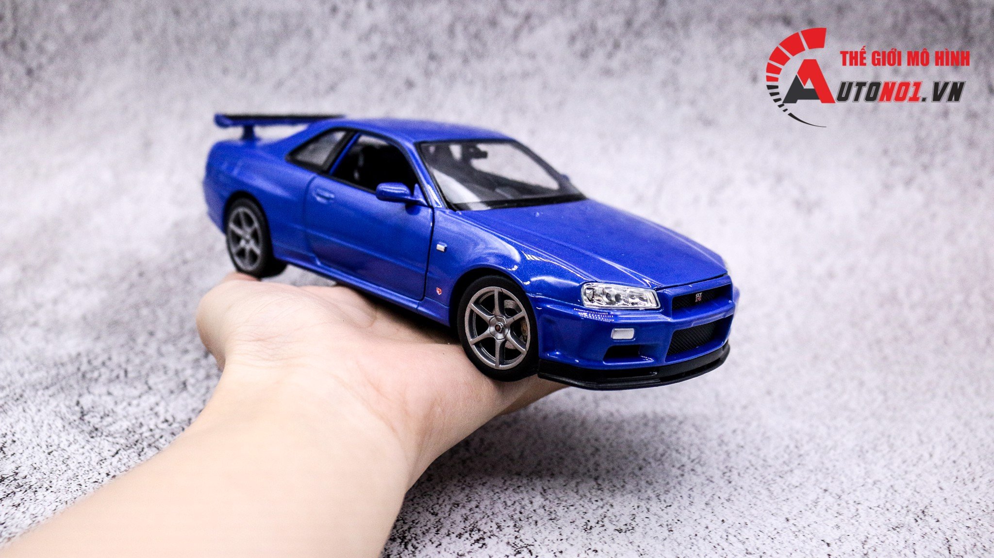 MÔ HÌNH XE NISSAN SKYLINE GT-R R34 BLUE 1:24 WELLY 7450 