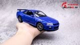  MÔ HÌNH XE NISSAN SKYLINE GT-R R34 BLUE 1:24 WELLY 7450 