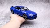  MÔ HÌNH XE NISSAN SKYLINE GT-R R34 BLUE 1:24 WELLY 7450 