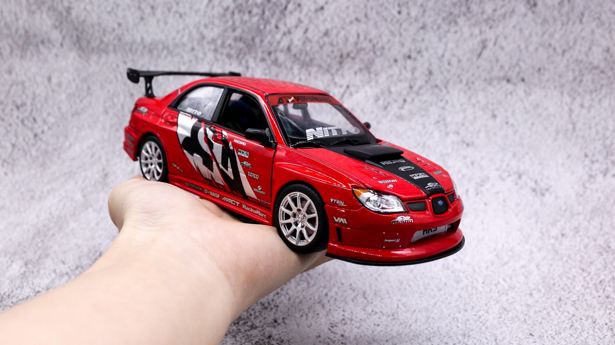  Mô hình xe Subaru Apr Impreza Performance tỉ lệ 1:24 Welly 5838 