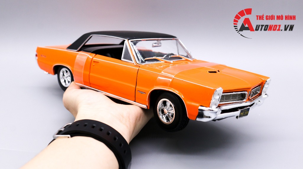  Mô hình xe 1965 Pontiac GTO Hurst Edition Orange tỉ lệ 1:18 Maisto 2918 