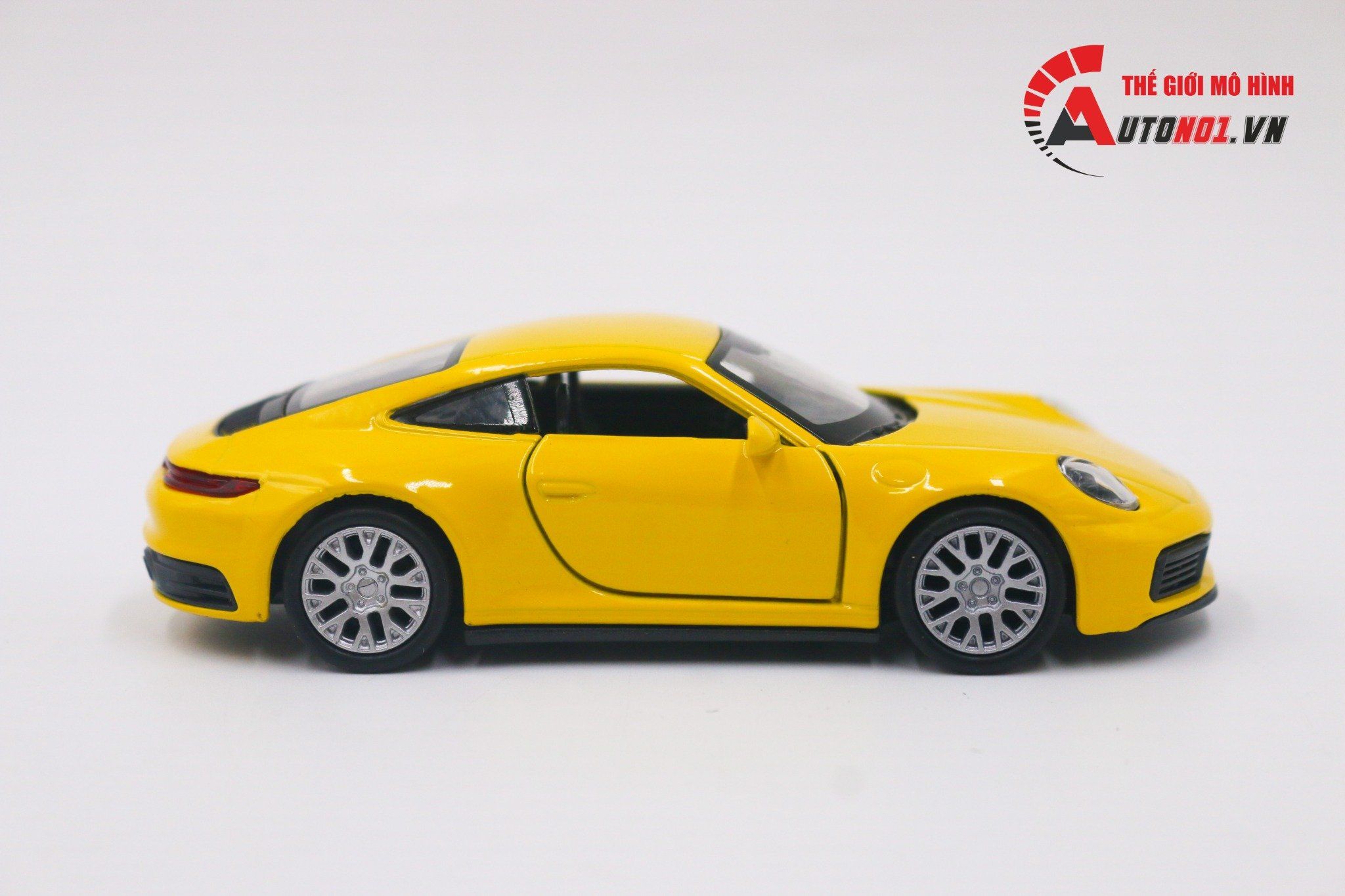  Mô hình xe Porsche 911 Carrera 4s Yellow 1:36 Welly OT011 