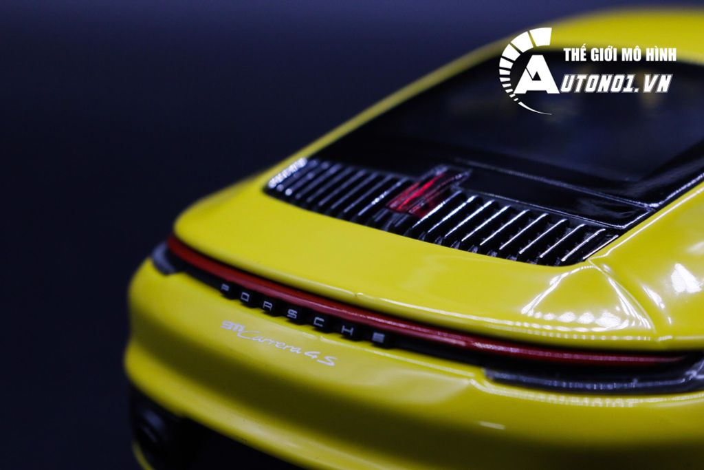 MÔ HÌNH XE PORSCHE 911 CARRERA 4S YELLOW 1:24 WELLY 7250