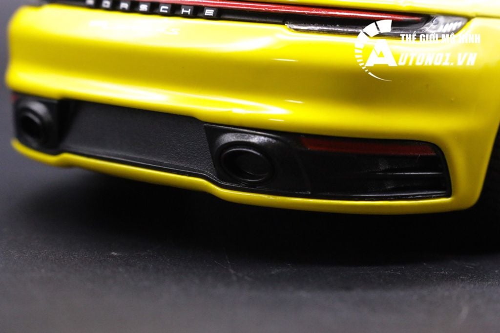 MÔ HÌNH XE PORSCHE 911 CARRERA 4S YELLOW 1:24 WELLY 7250