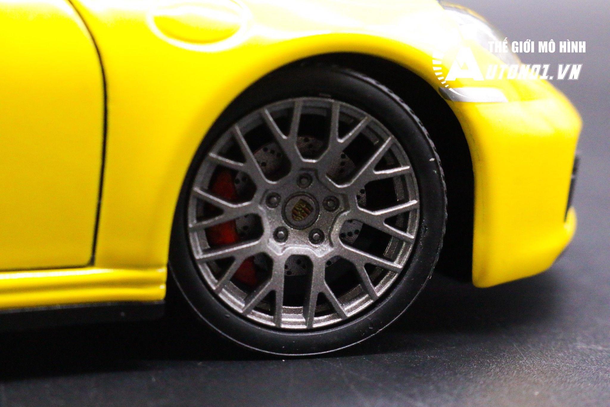  Mô hình xe Porsche 911 Carrera 4s đánh lái được, mở được capo trước, 2 cửa hai bên 1:24 Welly OT006 