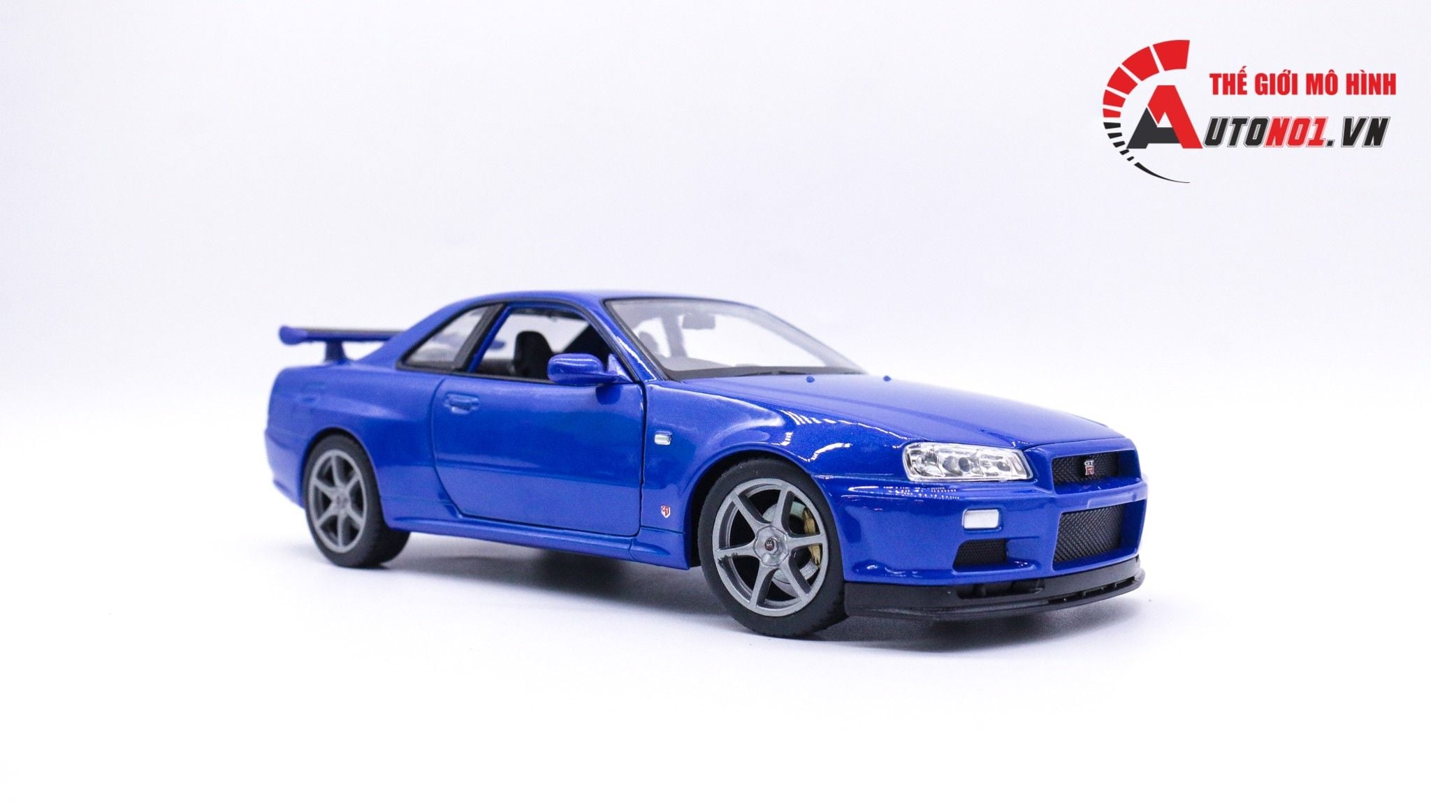  MÔ HÌNH XE NISSAN SKYLINE GT-R R34 BLUE 1:24 WELLY 7450 