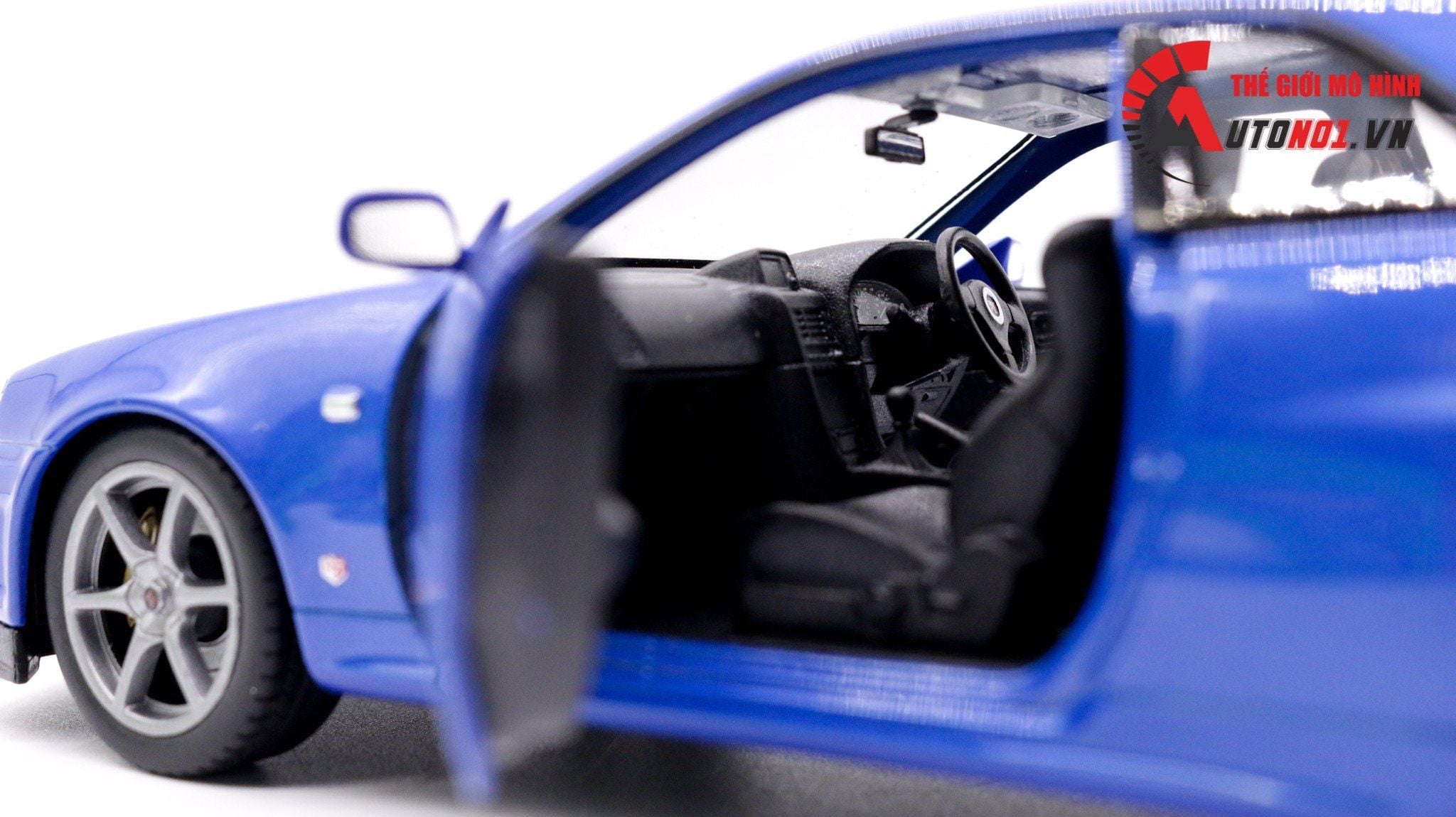  MÔ HÌNH XE NISSAN SKYLINE GT-R R34 BLUE 1:24 WELLY 7450 
