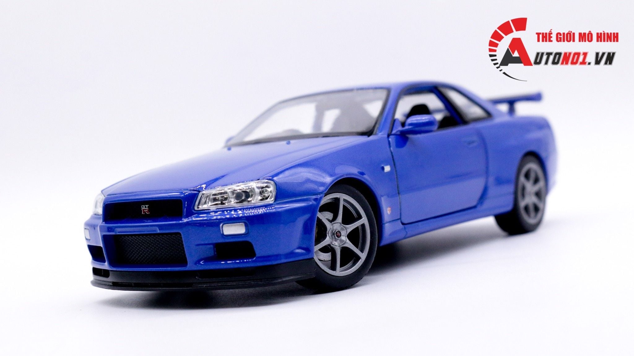  MÔ HÌNH XE NISSAN SKYLINE GT-R R34 BLUE 1:24 WELLY 7450 