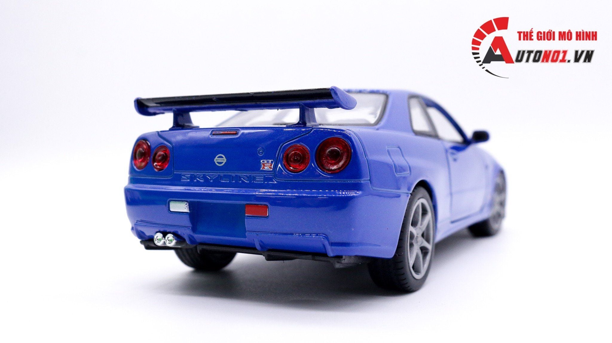  MÔ HÌNH XE NISSAN SKYLINE GT-R R34 BLUE 1:24 WELLY 7450 