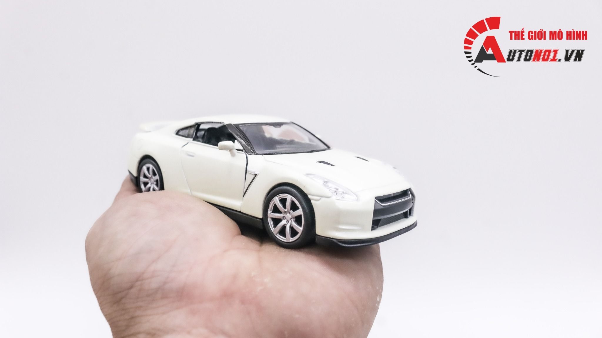  Mô hình xe Nissan GTR white 1:36 Welly OT010 