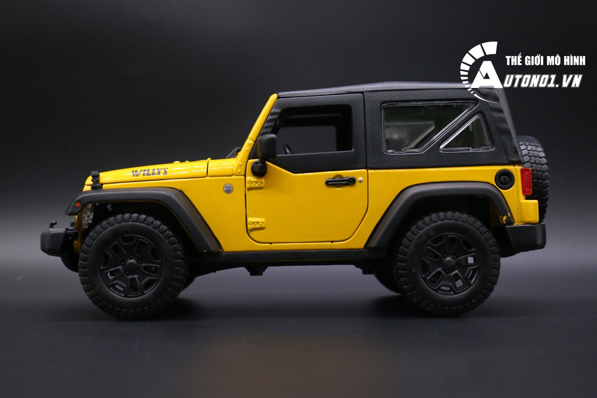  Mô hình xe Jeep Wrangler 2014 yellow có mui 1:18 Maisto 2636 