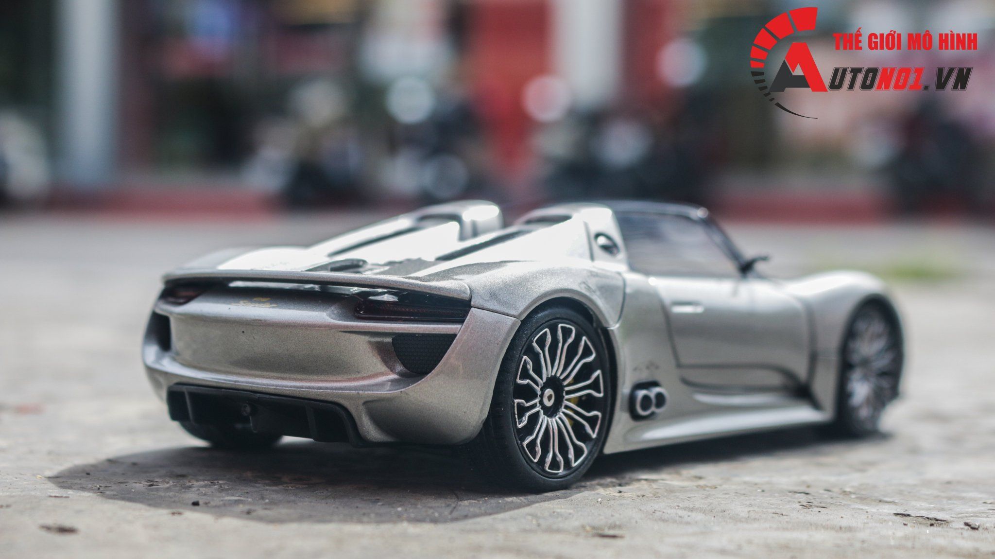  Mô hình xe Porsche 918 Spyder mở được 2 cửa 1:24 Welly OT558 