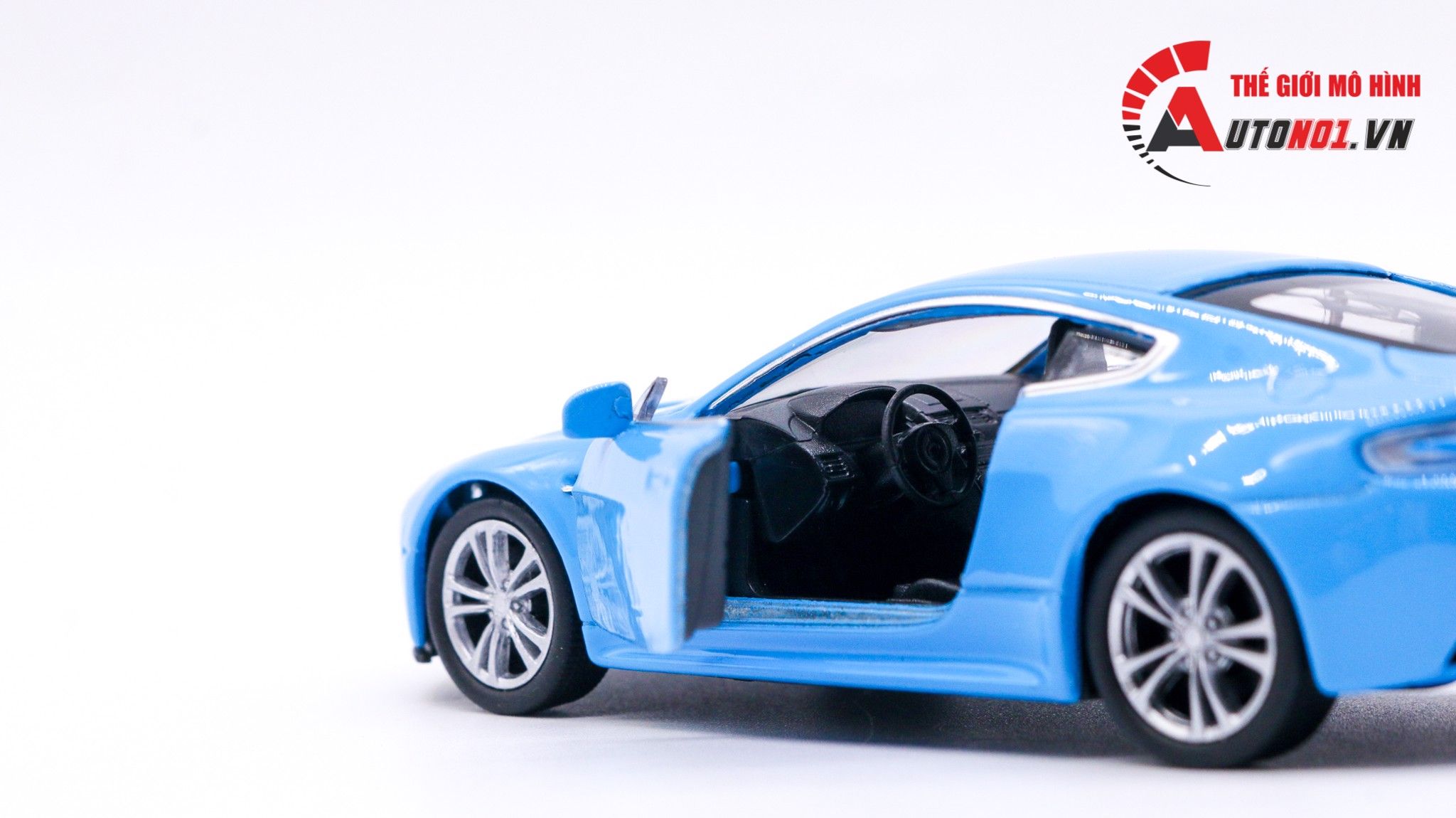  Mô hình xe Aston Martin V12 Vantage Baby Blue 1:36 Welly 7510 