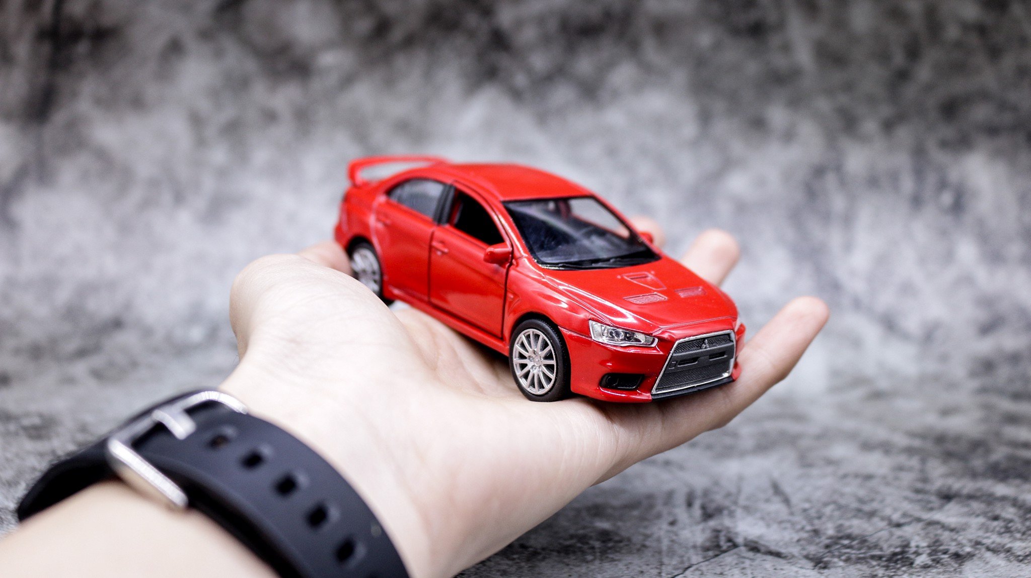 MÔ HÌNH MISUBISHI LANCER EVOLUTION RED 1:36 WELLY 4438