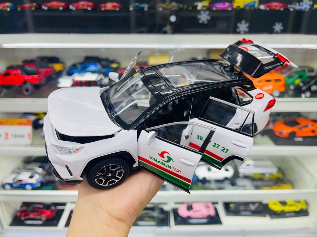 Mô hình xe độ dịch vụ taxi Toyota RAV4 Vinasun tỉ lệ 1:24 Alloy Autono1 OT549