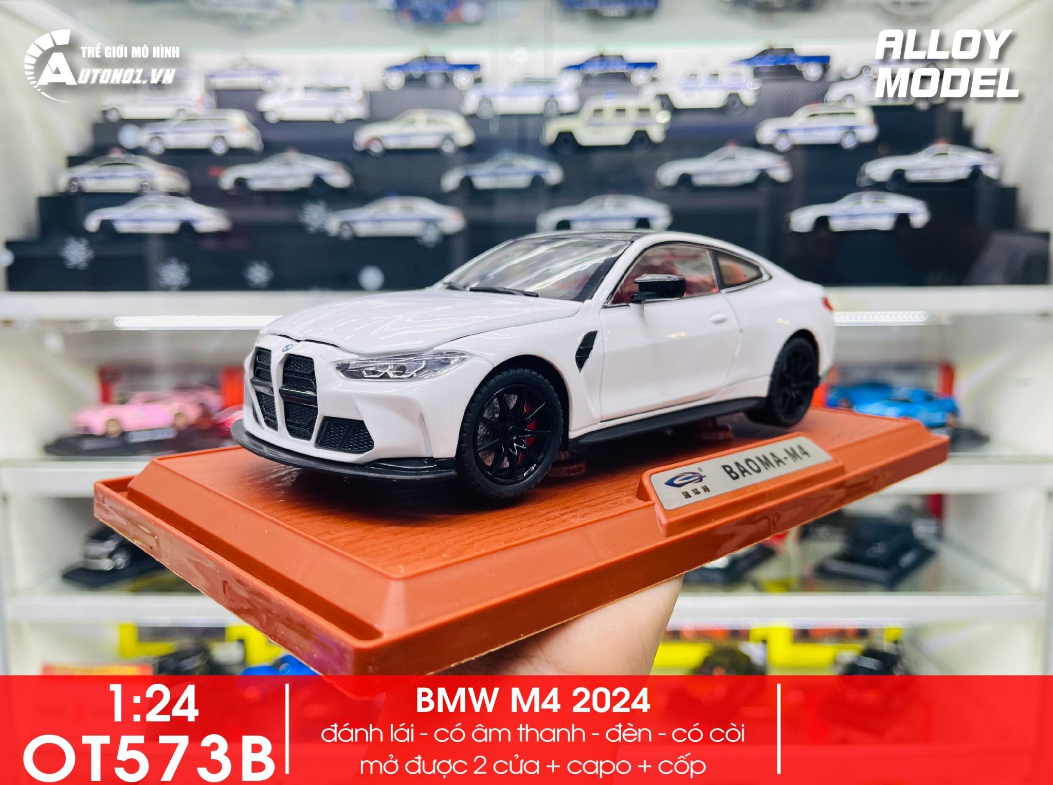  Mô hình xe BMW M4 2024 full open - đánh lái - có đèn - âm thanh full kính tỉ lệ 1:24 Alloy model OT573 