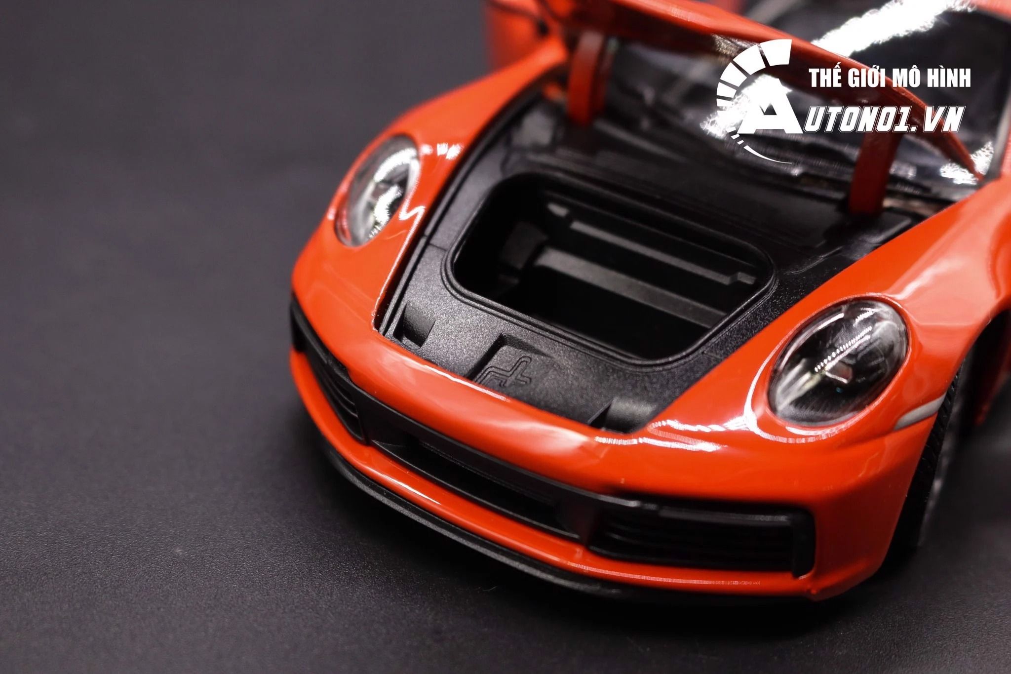  Mô hình xe Porsche 911 Carrera 4s đánh lái được, mở được capo trước, 2 cửa hai bên 1:24 Welly OT006 