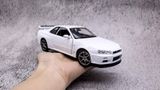  Mô hình xe Nissan Skyline Gt-R R34 1:24 Welly OT132 