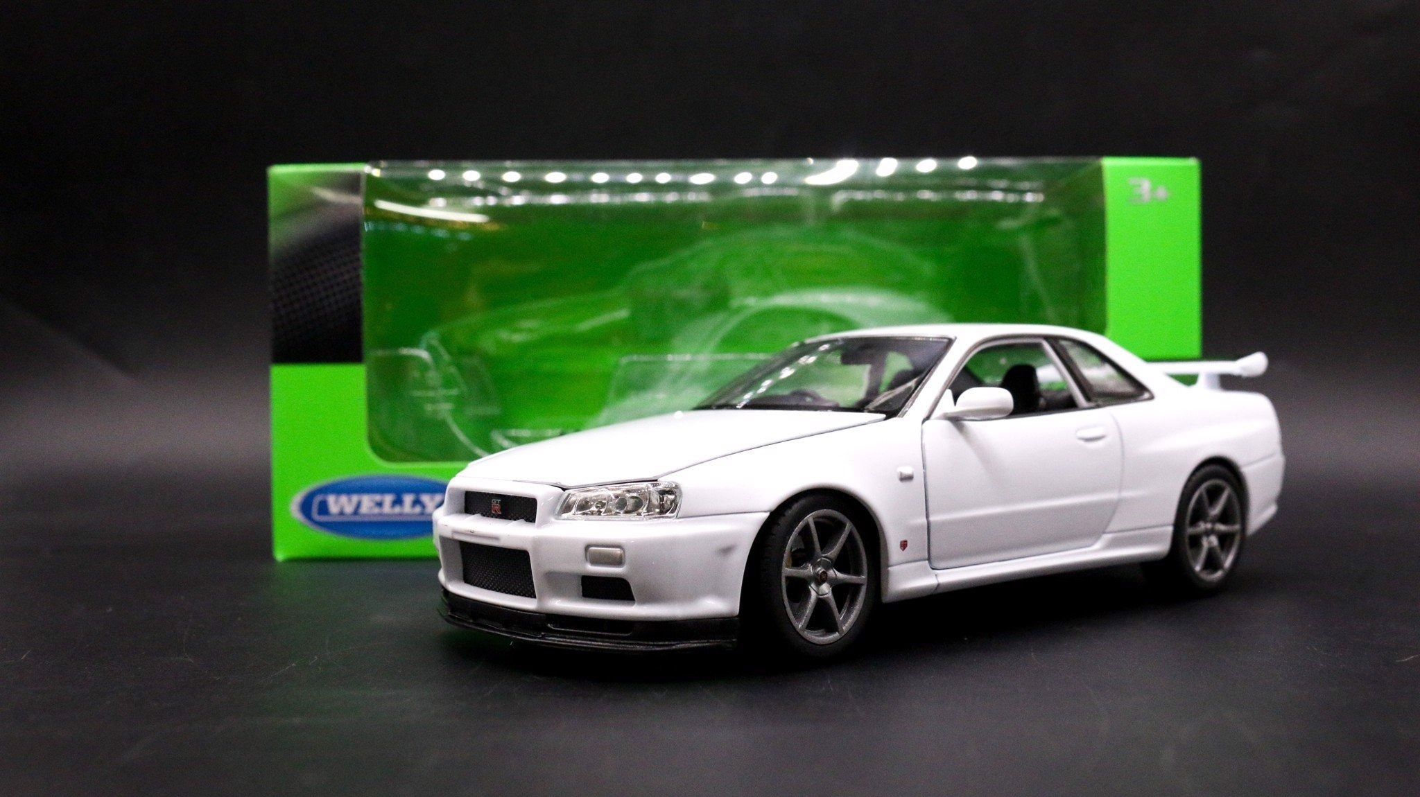  Mô hình xe Nissan Skyline Gt-R R34 1:24 Welly OT132 